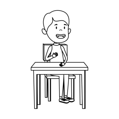 okul masasında oturan mutlu öğrenci çocuk