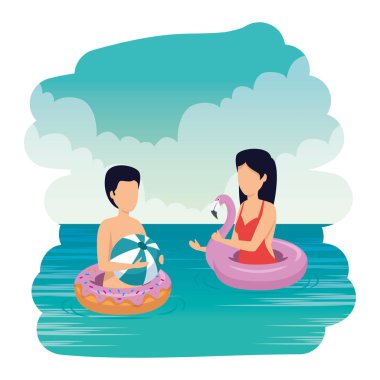 balon ve plajda yüzen genç çift