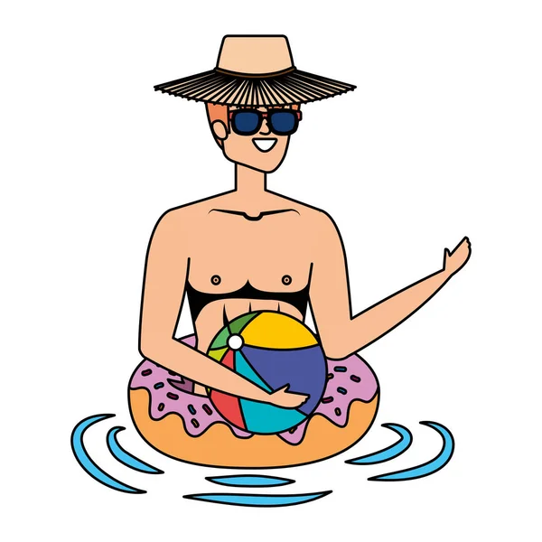 Çörek arabası ve plaj balonu karakteri olan genç bir adam.