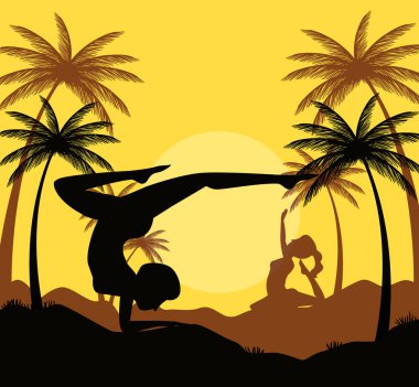 Kadınlar yoga pozisyonlarını palmiye ve dağlarla çalışırlar.