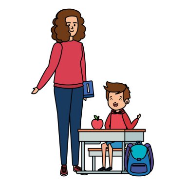 kadın öğretmen ile okul masasında mutlu öğrenci çocuk