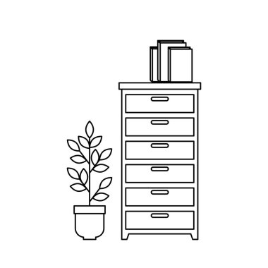 Kitapları ve çiçekleri olan ahşap çekmece