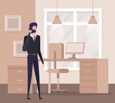 ofiste akıllı telefon ile arayan zarif işadamı