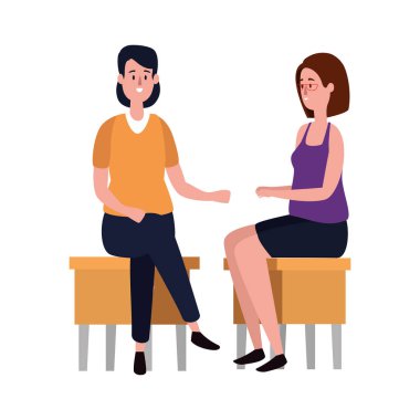 zarif iş kadınları banklarda oturmuş