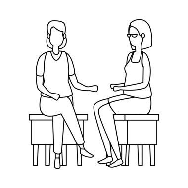 zarif iş kadınları banklarda oturmuş