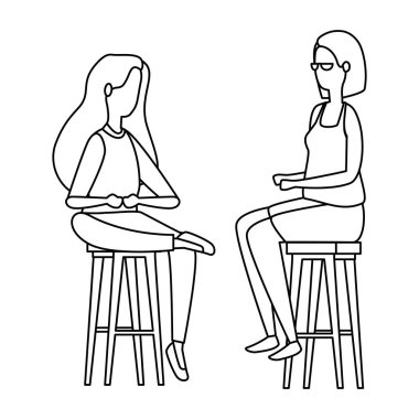 zarif iş kadınları banklarda oturmuş