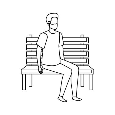 park sandalyesinde oturan sakallı genç ve rahat adam