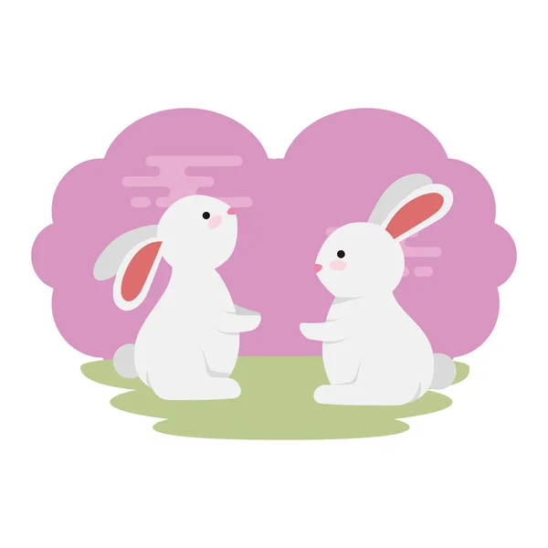 Милые и маленькие кролики пара в траве символов — стоковый вектор