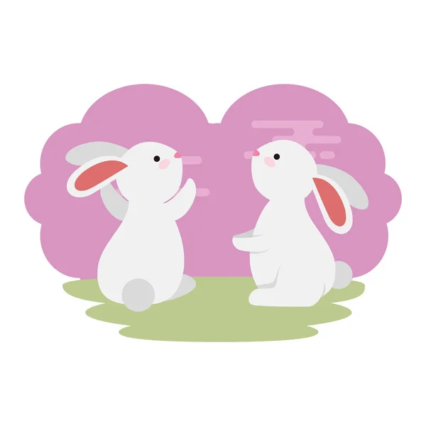 잔디 문자에 귀엽고 작은 토끼 커플 — 스톡 벡터