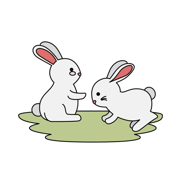 Słodkie i małe króliki para w postaci trawy — Wektor stockowy