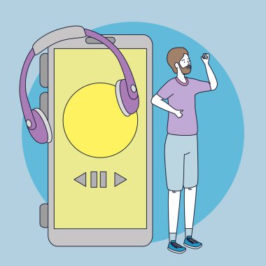 Kulaklığı ve akıllı telefonu olan genç bir adam.
