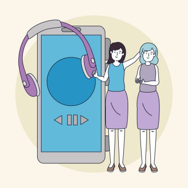 genç kızlar kulaklık ve akıllı telefon ile müzik dinlemek