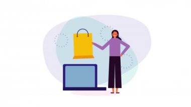 dizüstü bilgisayar ve e-ticaret uygulaması ile genç iş kadını
