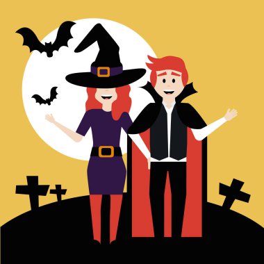 Cadı ve vampir kılığına girmiş genç çift.