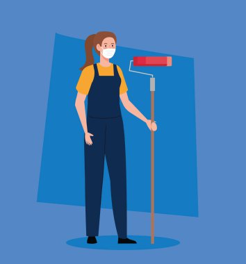 Tıbbi maske takan, boyacı silindiri takan, önleme Coronavirus covid 19 konsepti olan hoş bir kadın.