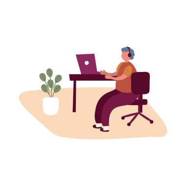 Yaşlı adam ev aktivitelerinde dizüstü bilgisayar kullanıyor.