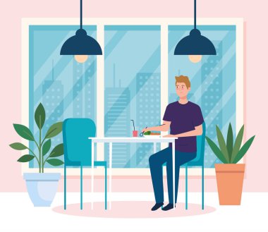 Yeni konsept restoranda sosyal mesafe, masada yemek yiyen adam, koruma, koronavirüsün önlenmesi, covid 19