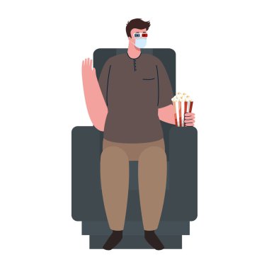 Coronavirus önleme, tek başına tıbbi maske takan adam, sandalye sinemasında oturuyor.