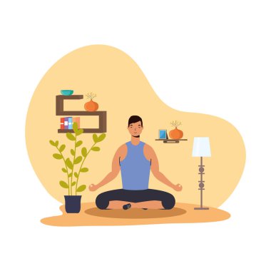 Evde yoga yapan bir adam var.