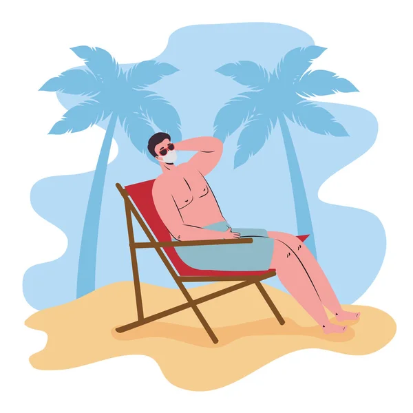 Mężczyzna w spodenkach w masce medycznej siedzi na plaży krzesła, turystyka z koronawirusem, zapobieganie covid 19 w letnie wakacje — Wektor stockowy