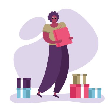 Alışveriş torbaları olan genç afro adam.