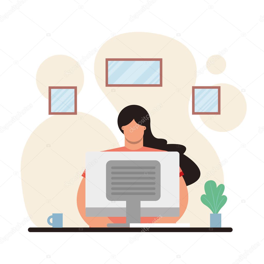 young woman using desktop working in the house