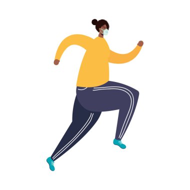 Tıbbi maske takan genç afro adam Avatar karakterini çalıştırıyor.