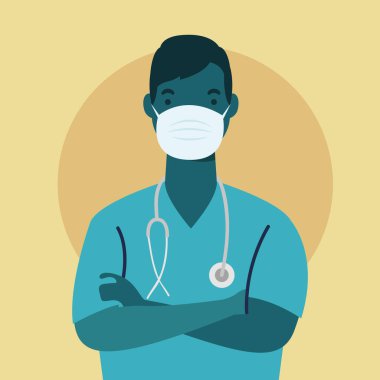Tıbbi maske takan genç erkek doktor.