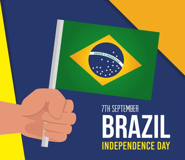 9月7日ブラジル独立記念日旗を手に — ストックベクタ