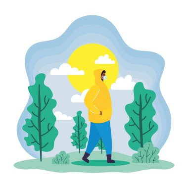 Bahar mevsiminde tıbbi maske takan afro genç adam.