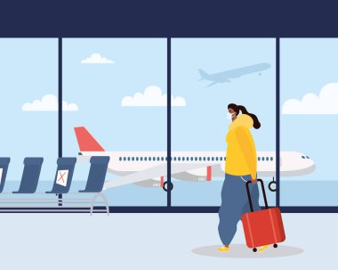 Bavul karakterli tıbbi maske takan afro genç bir kadın.