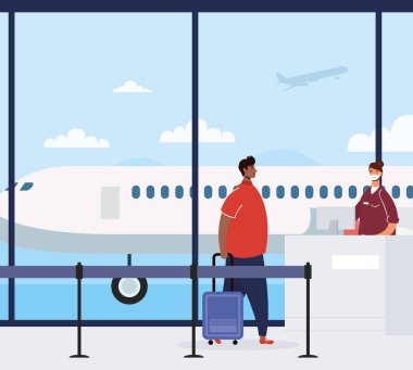 Havaalanında bavullu afro bir genç.