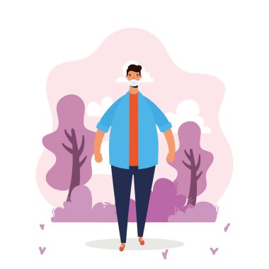 Tıbbi maske takan genç adam.