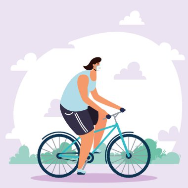 Bisiklette tıbbi maske takan genç adam.