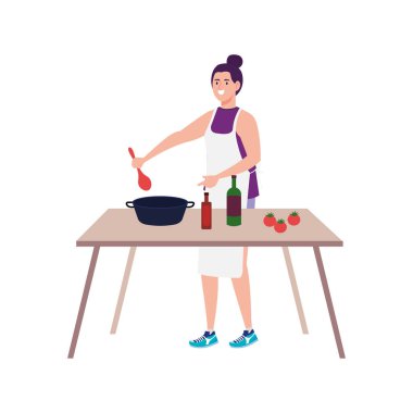 Beyaz arka planda, ahşap masa ile önlük kullanan bir kadın yemek pişiriyor.