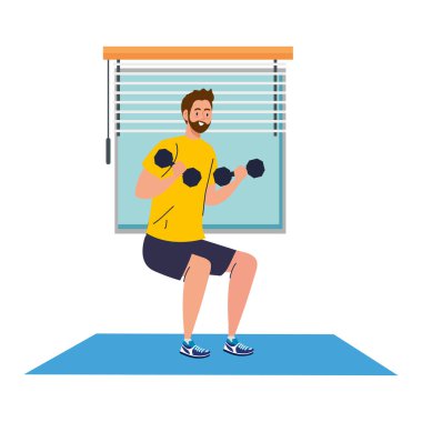 Adam evde dambıllarla çömeliyor, spor yapıyor.