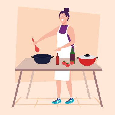 Ahşap masa, tencere, şişe ve sebzelerle yemek pişiren kadın.