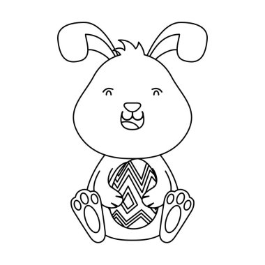 Sevimli küçük paskalya tavşanı yumurta kaldırıyor.