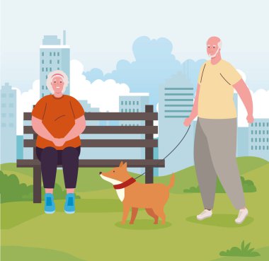 Köpek maskotuyla parkta yaşlı bir çift.