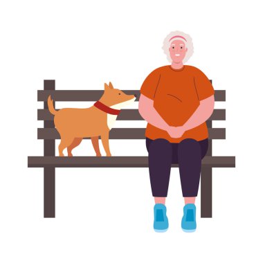 Park sandalyesinde köpeği olan sevimli yaşlı kadın.