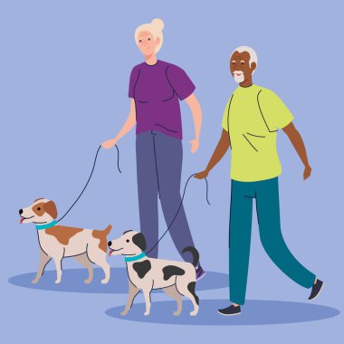 Köpeklerin maskotlarıyla yürüyen sevimli yaşlı bir çift.