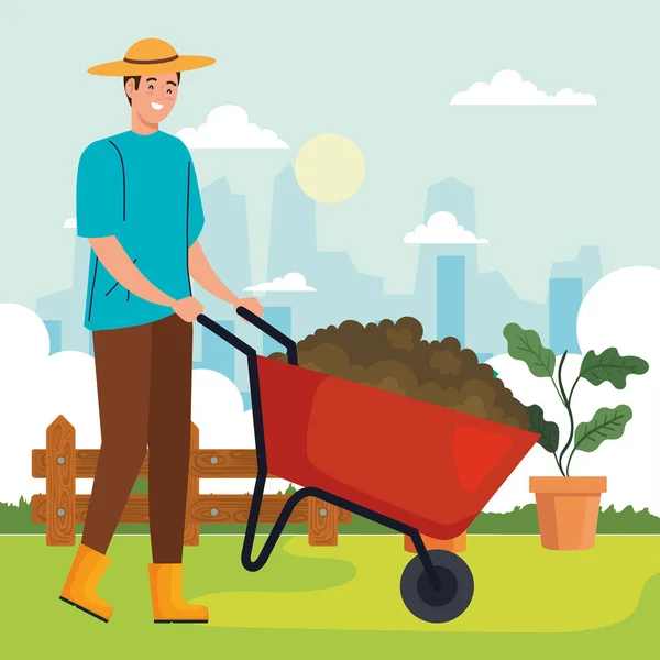 Jardinage homme avec brouette et conception vectorielle végétale — Image vectorielle