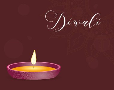 Kahverengi arka planda mum bulunan mutlu bayramlar.