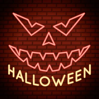 Cadılar bayramı harfleri balkabağı yüzlü neon ışıkta