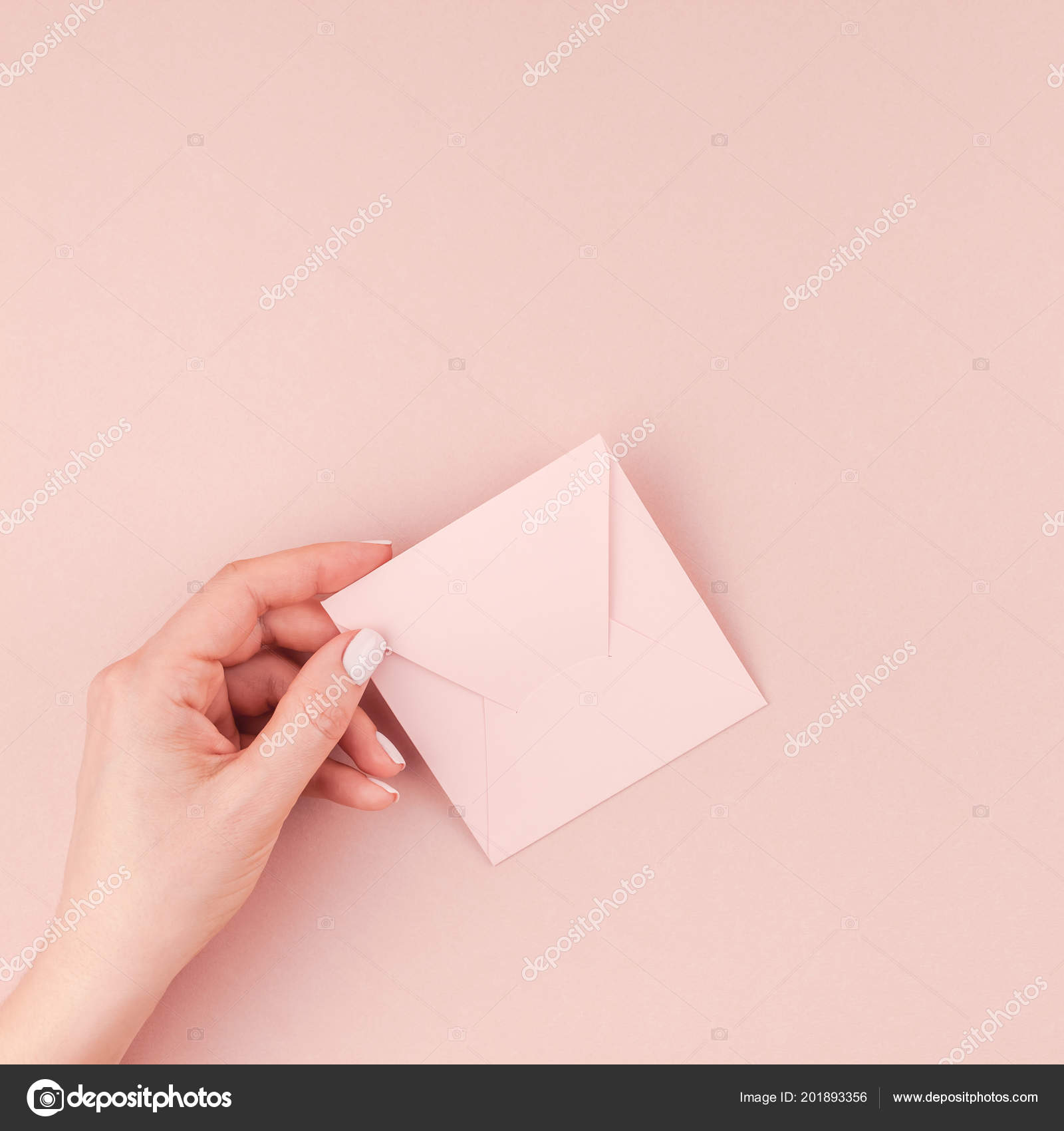 creative image woman hand holding small love letter copy space