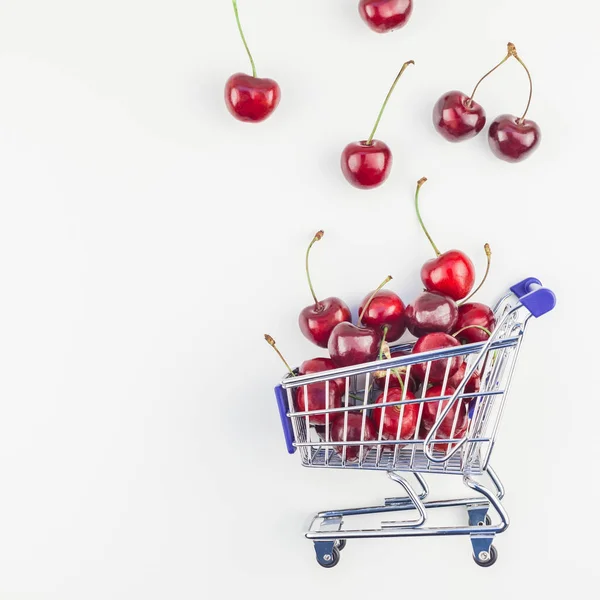 Square Image Ripe Cherries Shopping Cart Copy Space Isolated White — Stock Photo, Image
