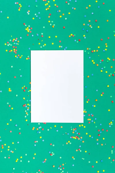 Creative New Year or Christmas greetings letter mockup flat lay top view Xmas holiday celebration envelope on green paper background. Template mock up greeting card or your text design 2019 2020