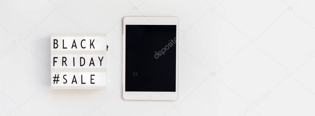 Creative Top view flat lay promotion composition Black friday sale text on lightbox tablet white background copy space Template Black friday sale mockup thanksgiving advertising Long wide banner