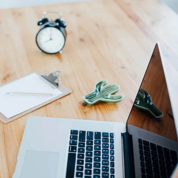 Freelance workplace with laptop — Stock Photo, Image