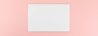 Boş A4 kağıt levha mockup pembe bir arka plan üzerinde